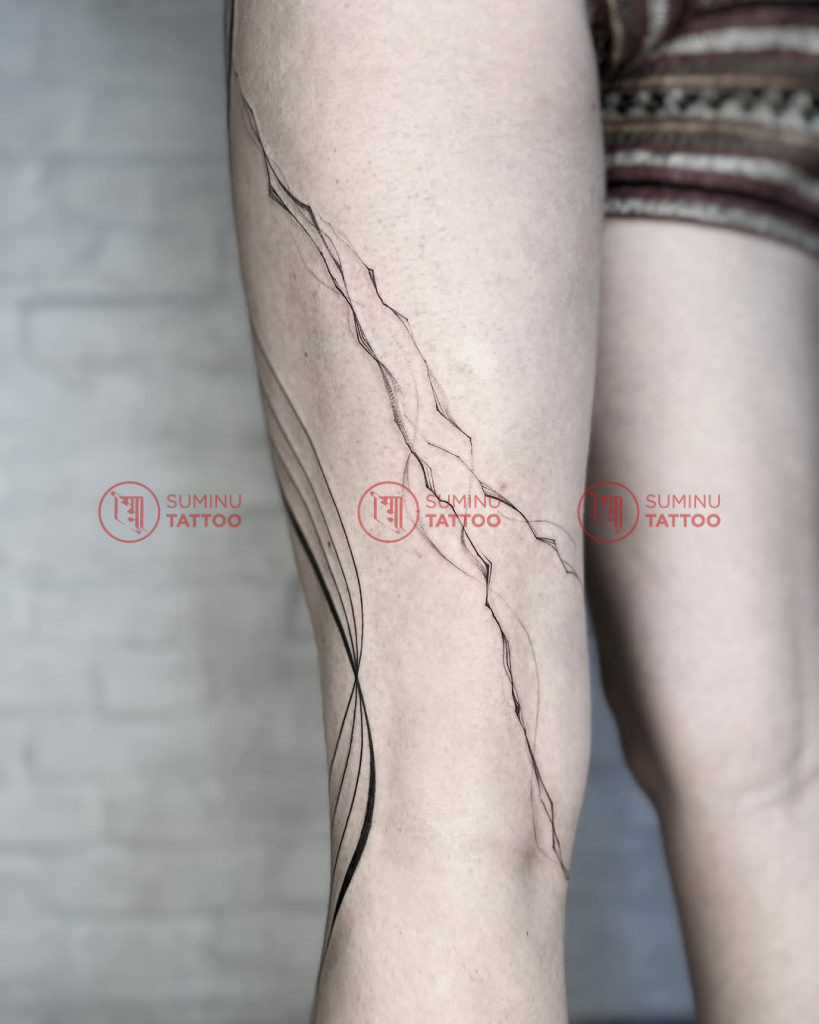 fine line leg tattoo for women