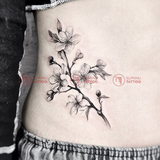 cherry blossom tattoo for women waist tattoo Tattoo Shop in Nepal, Tattoo in Nepal