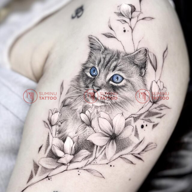 pet cat tattoo with floral patterns suminu tattoo